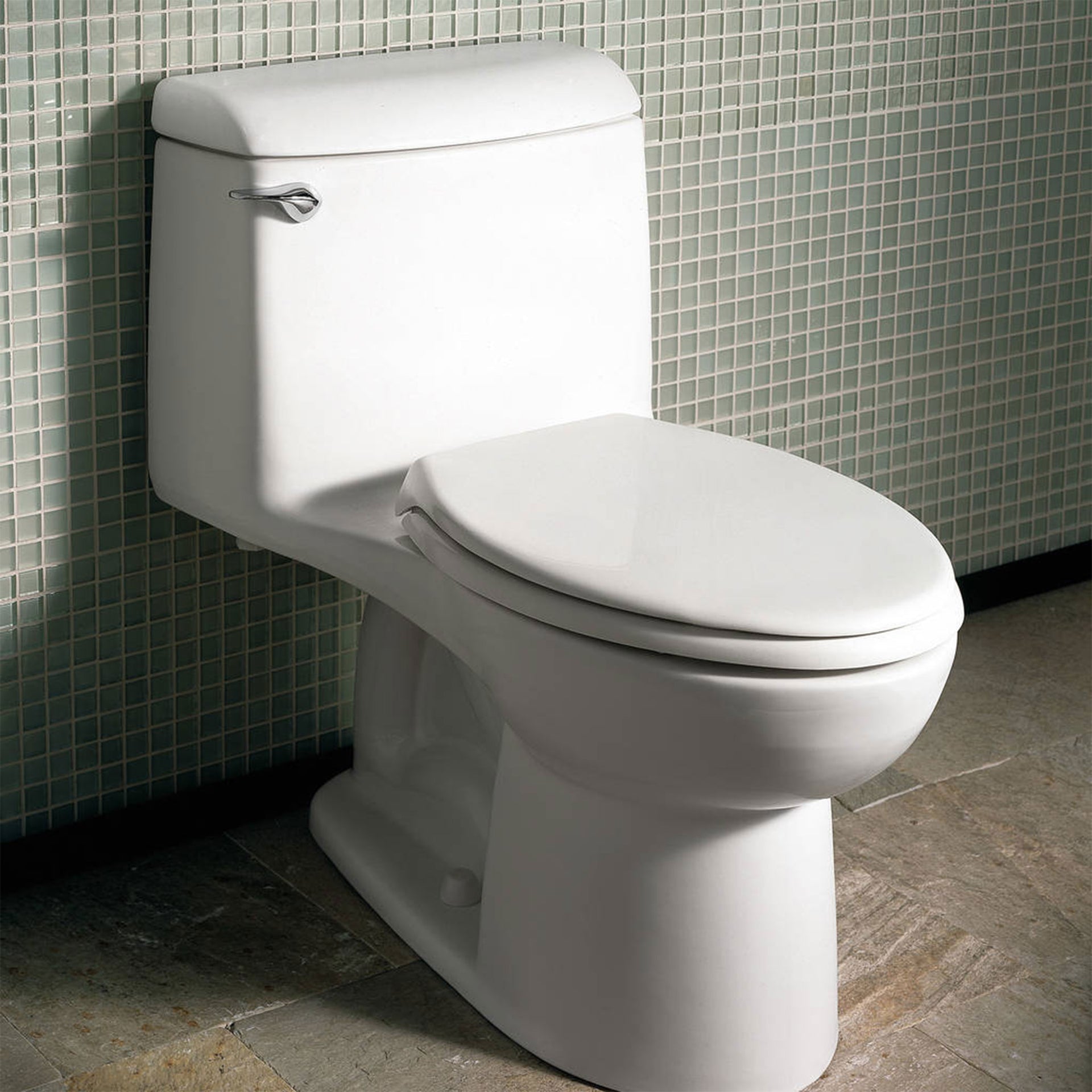 American Standard Tropic FloWise OnePiece Toilet Canaroma Bath & Tile